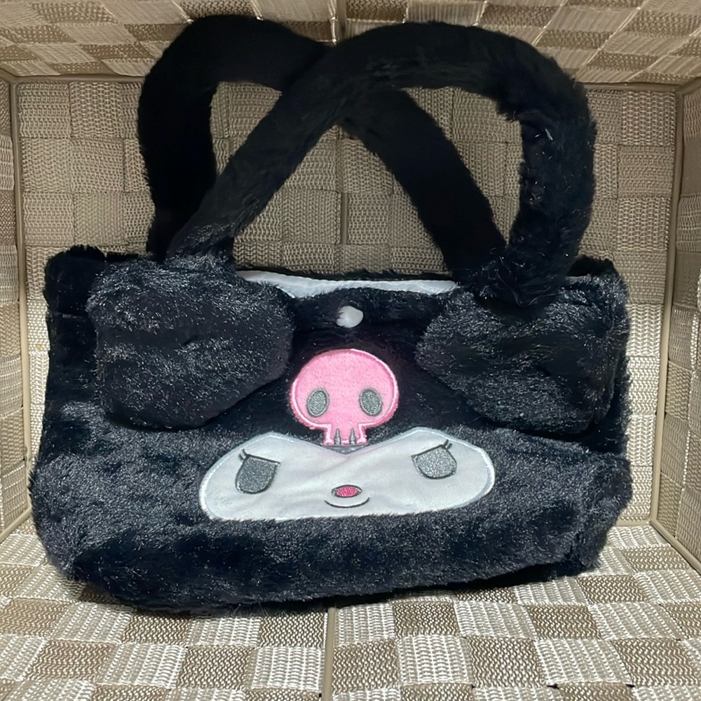 Sanrio black fuzzy 7x10” shoulder purse. New, no tags.